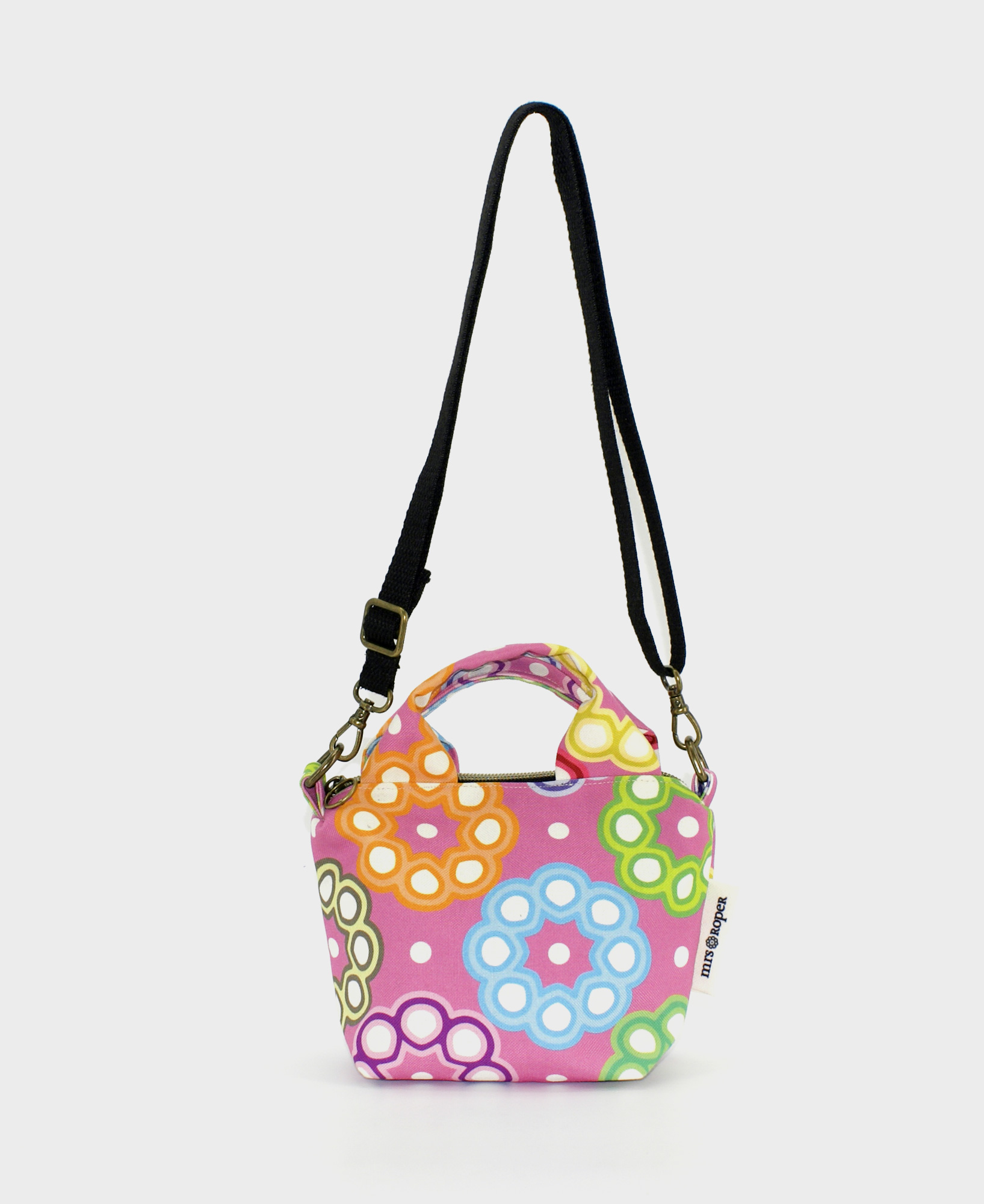 Bolso pequeño de mujer con asas, con estampado geométrico multicolor, realizado en tejido RPET de la marca mrs Roper.