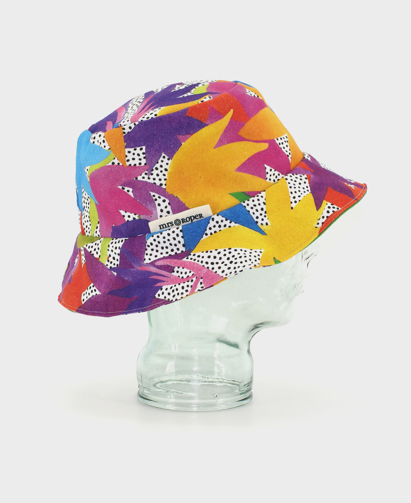 Gorro tipo bucket con estampado floral multicolor, hecho en algodón BCI de la marca mrs Roper.
