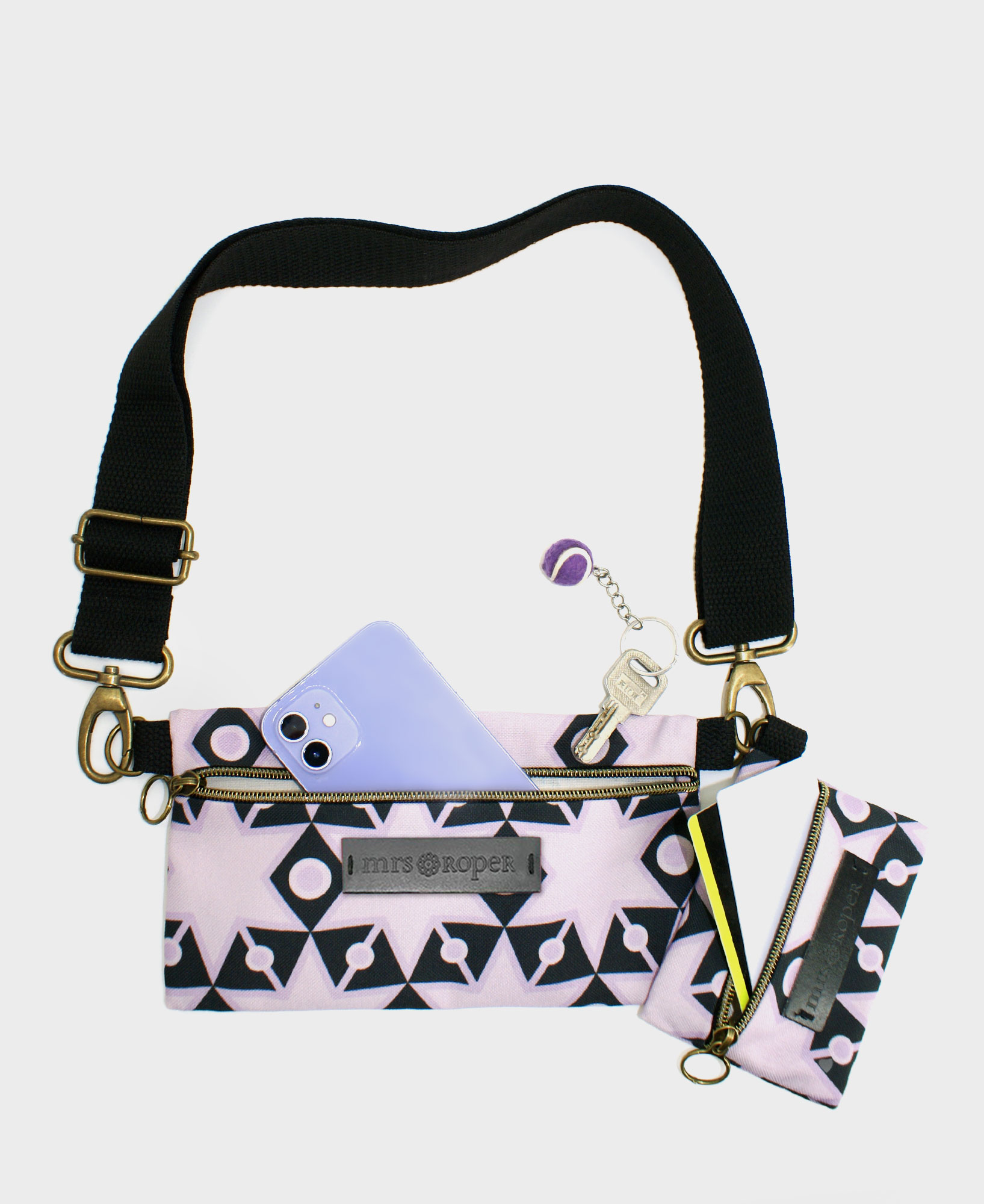 Bolso pequeño con monedero de mujer Dúo con estampado geométrico de estrellas en negro y lila, hecho en tejido RPET de la marca mrs Roper.