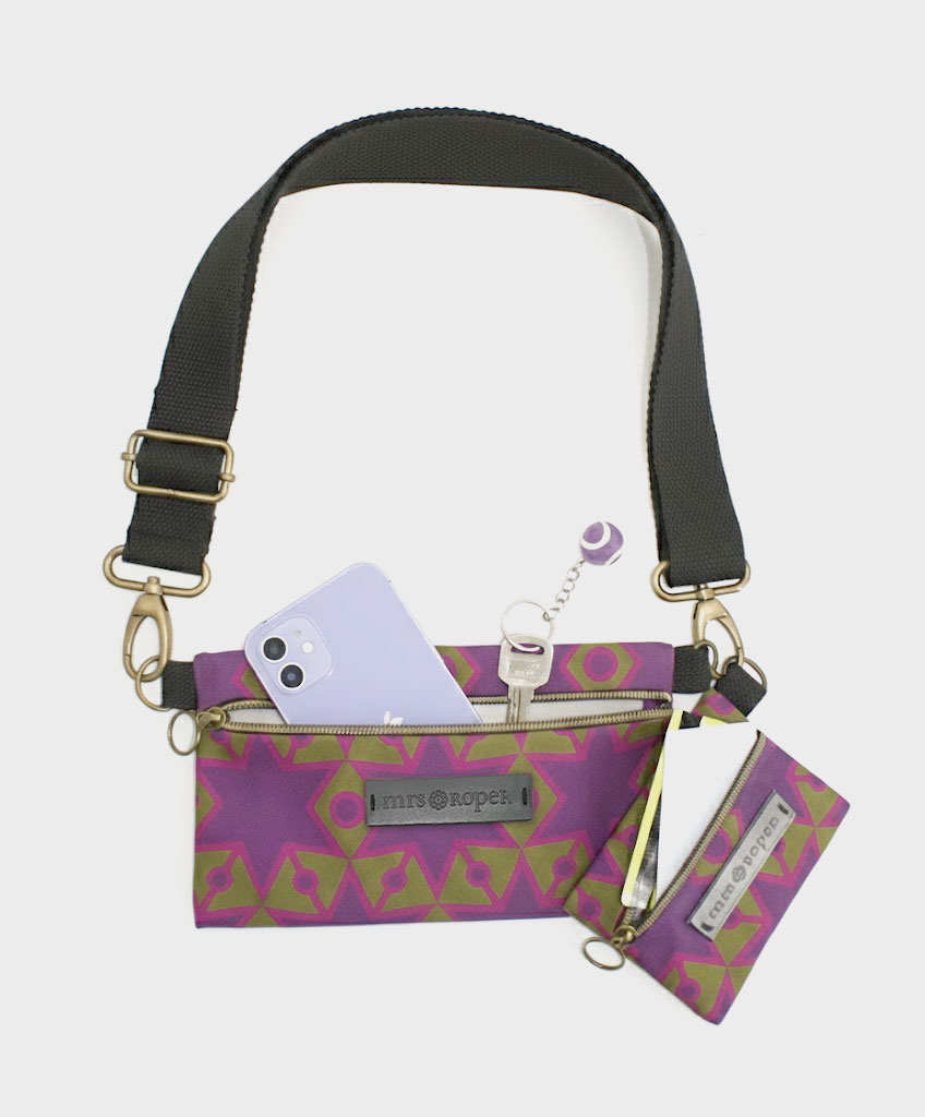 Bolso pequeño con monedero de mujer Dúo con estampado geométrico morado y verde de estrellas hecho en tejido reciclado de la marca mrs Roper.