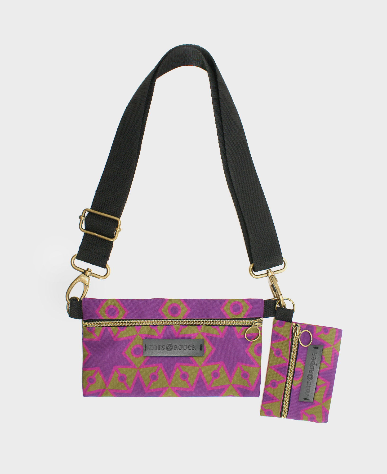 Bolso pequeño con monedero de mujer Dúo con estampado geométrico de estrellas verde y lila, hecho con tejido RPET de la marca mrs Roper.