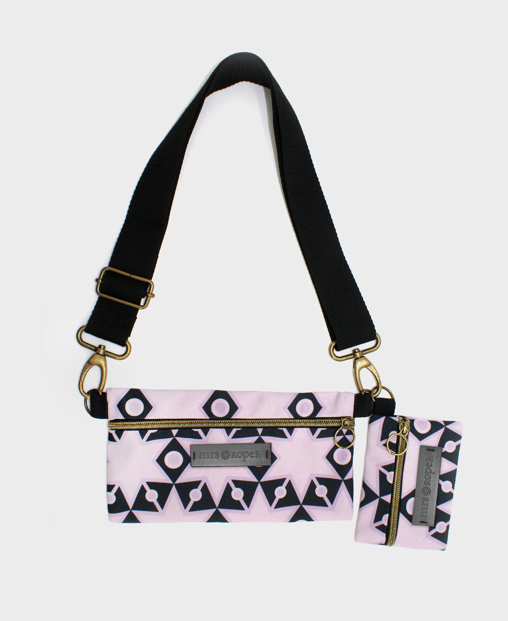 Bolso pequeño con monedero de mujer Dúo con estampado geométrico de estrellas en negro y lila, hecho en tejido RPET de la marca mrs Roper.