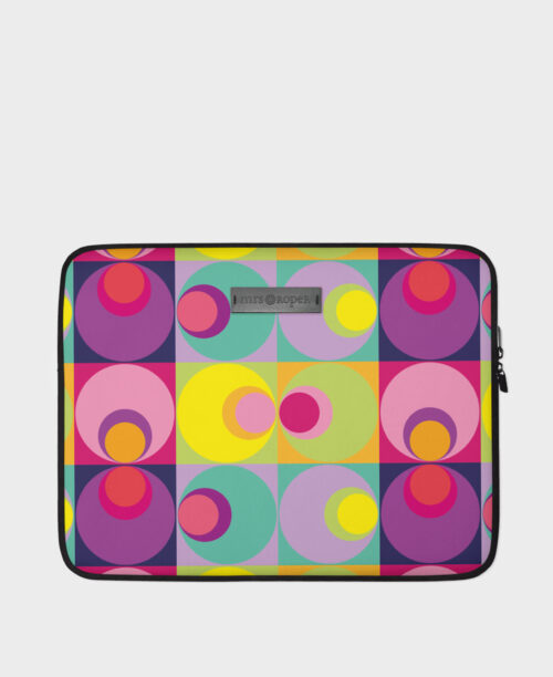 Funda de ordenador con estampado geométrico de círculos multicolor, hecha en neopreno de la marca mrs Roper.